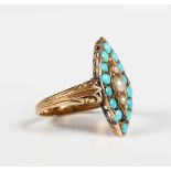 A late Victorian gold, turquoise and half-pearl marquise shaped cluster ring with decorated