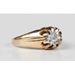 A 9ct gold and diamond single stone ring, mounted with a circular cut diamond, indistinct mark,