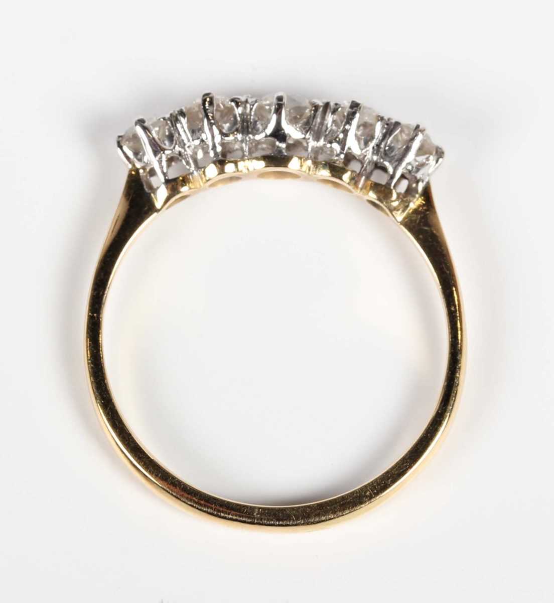 A gold and diamond five stone ring, claw set with a row of graduated old cut diamonds, detailed ‘ - Image 4 of 5