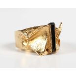 A Finnish Björn Weckström gold and tourmaline ring in an abstract design, mounted with a