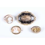 A gold and oval shell cameo ring, carved as a portrait of a lady, detailed '9ct’, weight 4.9g,