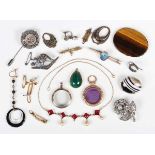 A small group of jewellery, including a gold and oval opal doublet bar brooch, detailed ‘9ct’,