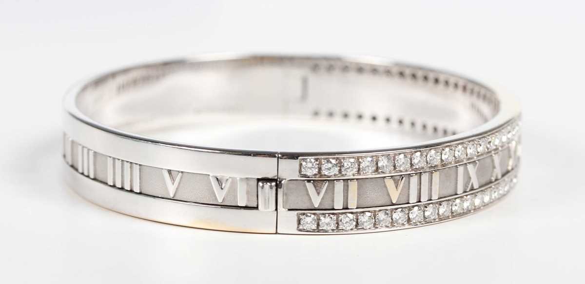A Tiffany & Co 18ct white gold and diamond Atlas oval hinged bangle, detailed ‘Tiffany & Co 1995 750 - Image 4 of 7