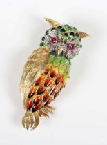 A gold, diamond, ruby and varicoloured enamelled brooch, designed as an owl, with circular cut