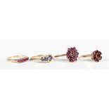 A 9ct gold and garnet cluster ring, claw set with circular cut garnets, London 1967, ring size