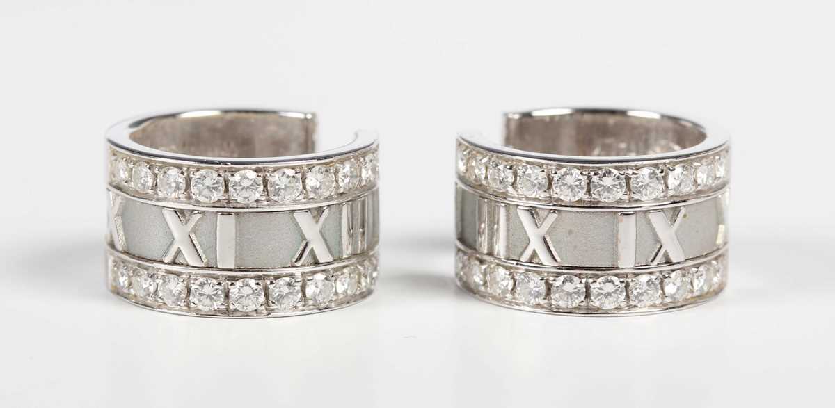 A pair of Tiffany & Co 18ct white gold and diamond Atlas hoop earrings, each detailed ‘Tiffany &