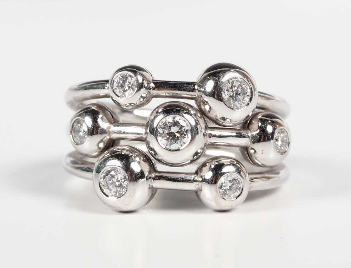 A Hans D. Krieger white gold and diamond bubble ring, mounted with seven circular cut diamonds, - Image 2 of 5