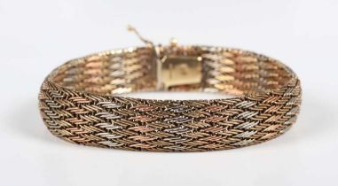 A 9ct three colour gold mesh link bracelet on a snap clasp, import mark Sheffield 1985, weight 22.