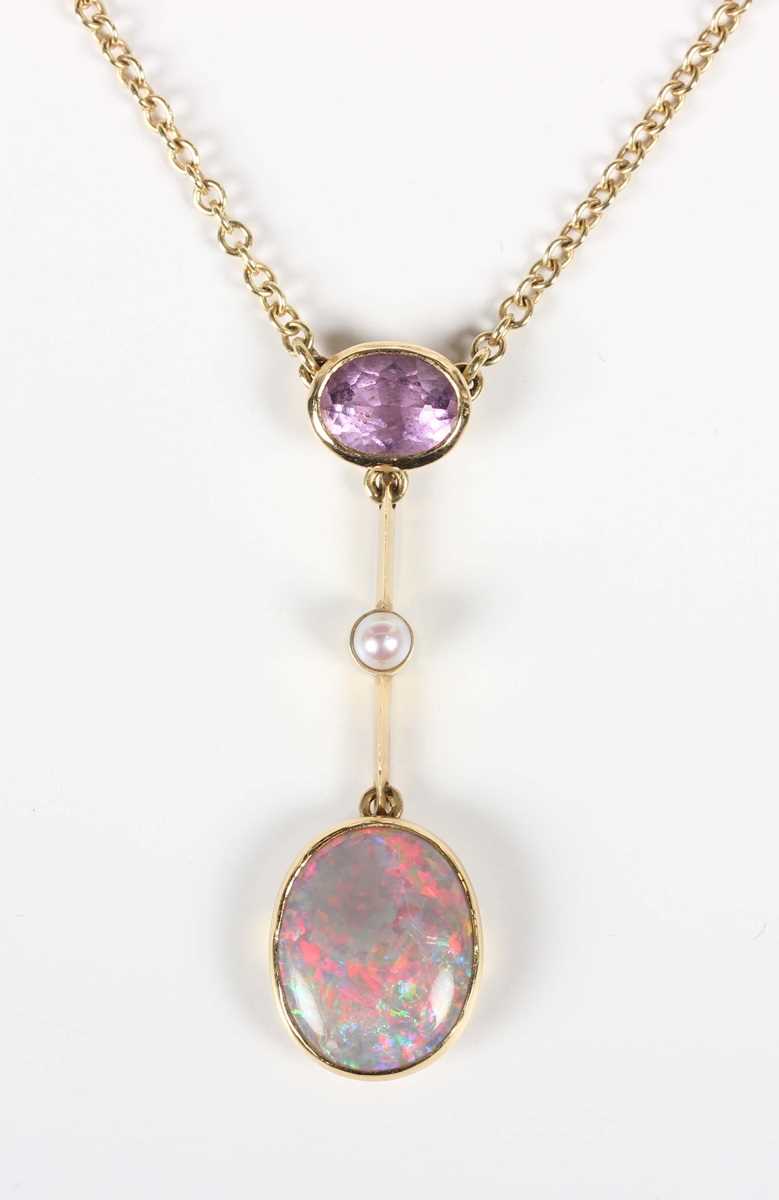 A gold, opal, amethyst and cultured pearl pendant necklace, the front collet set with an oval