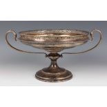 A George V silver table centrepiece tazza of shallow circular form with pierced rim above a baluster
