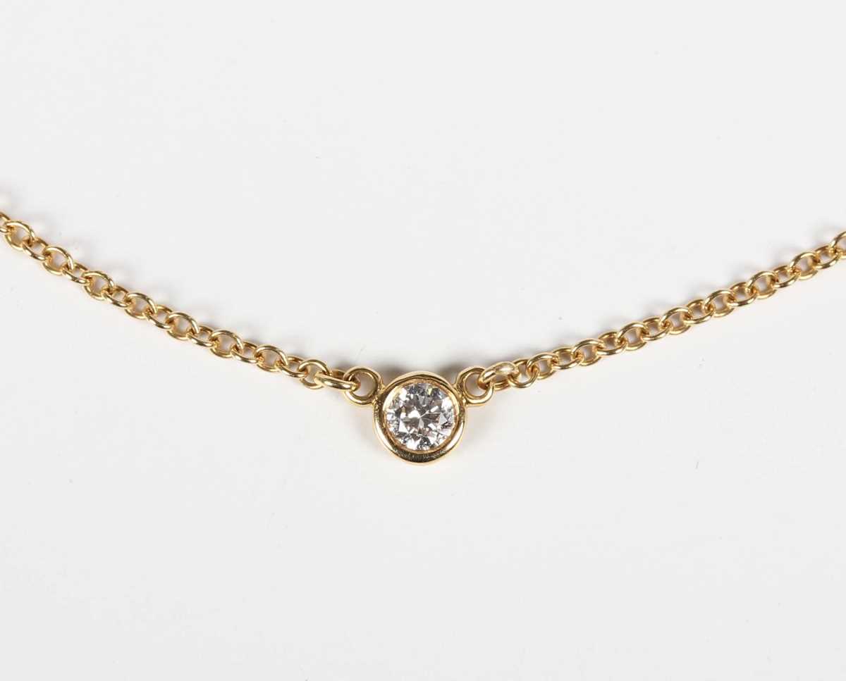 A Tiffany & Co gold 'Diamonds by the Yard' necklace, designed by Elsa Peretti, the front mounted