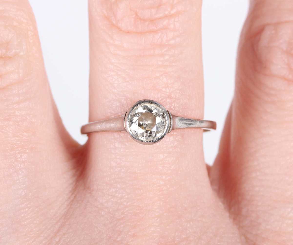 A gold, platinum and diamond single stone ring, collet set with a cushion cut diamond, unmarked, - Image 5 of 5