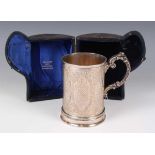 A Victorian silver cylindrical christening tankard with engraved inscription within strapwork and