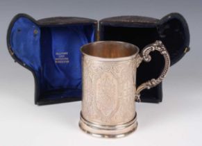 A Victorian silver cylindrical christening tankard with engraved inscription within strapwork and
