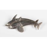 A Georg Jensen sterling silver brooch, designed as two dolphins, detailed ‘Georg Jensen Sterling