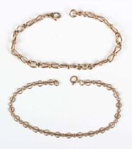 A 9ct gold multiple link bracelet on a sprung hook shaped clasp, length 18cm, and a gold circular