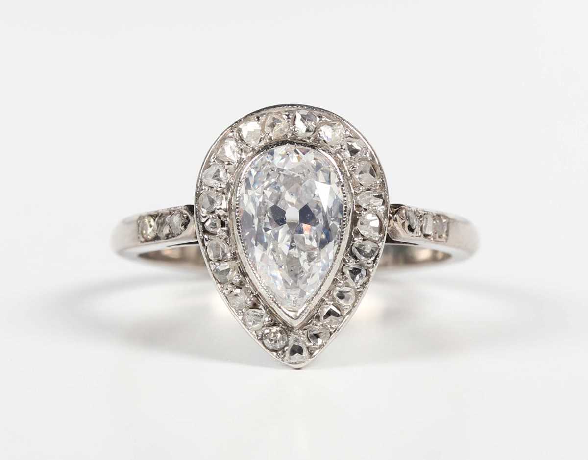 A diamond pear shaped cluster ring, mounted with the principal pear shaped diamond at the centre, - Image 2 of 5