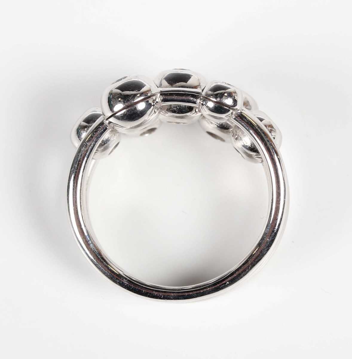 A Hans D. Krieger white gold and diamond bubble ring, mounted with seven circular cut diamonds, - Image 4 of 5