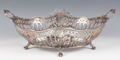 An early 20th century German silver oval basket, the pierced sides cast with opposing oval bust
