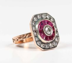 A gold, silver, ruby and diamond cluster ring, collet set with the principal old cut diamond