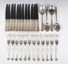 An Elizabeth II canteen of silver Dubarry pattern cutlery, comprising four tablespoons, twelve table