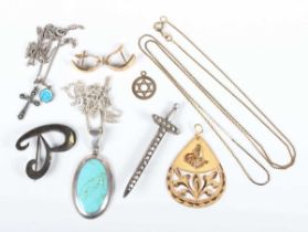 A small group of jewellery, including a Middle Eastern gold pear shaped pendant in a pierced foliate