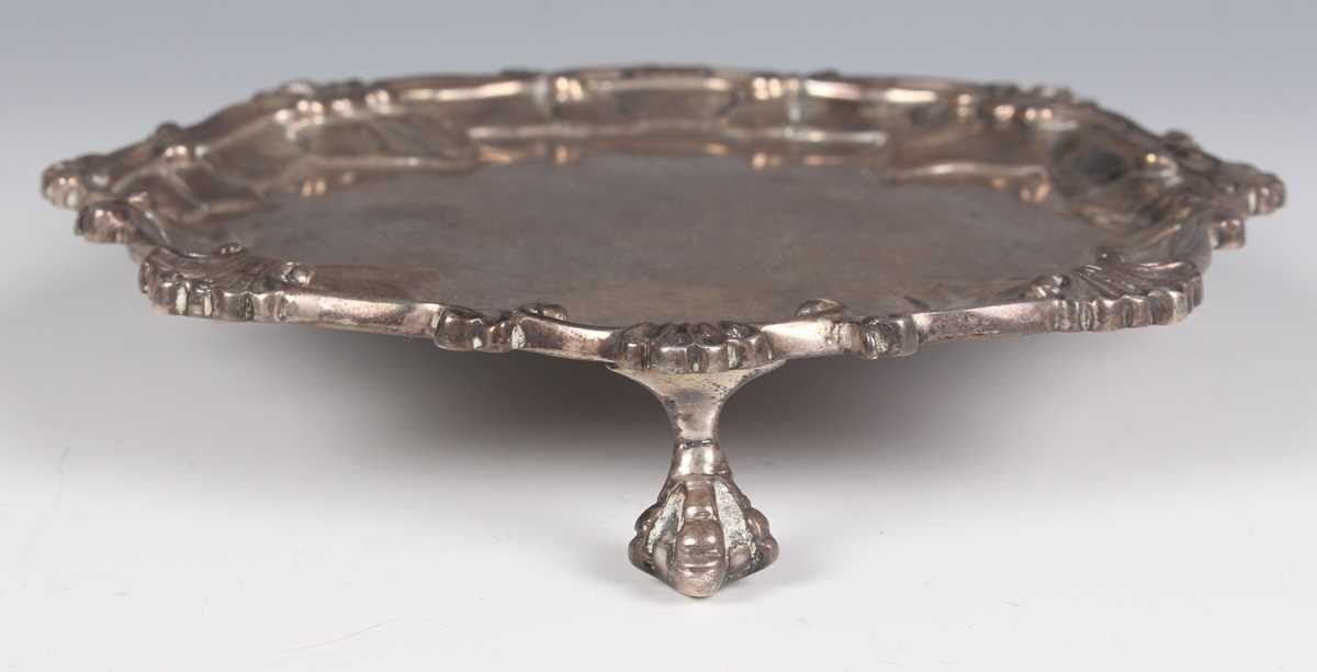 A late Victorian silver shaped circular card salver with cast scallop shell and scroll rim, on - Image 2 of 3