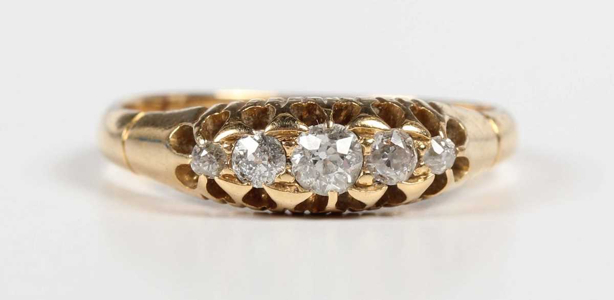 A gold and diamond five stone ring, mounted with old cut diamonds graduating in size to the centre - Image 2 of 5