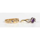 A gold, amethyst and diamond ring, claw set with a square cut amethyst between two circular cut