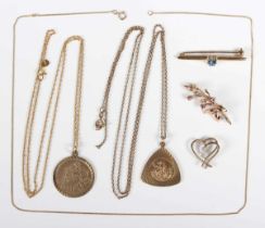 A small group of 9ct gold jewellery, comprising a bar brooch, mounted with a heart shaped treated