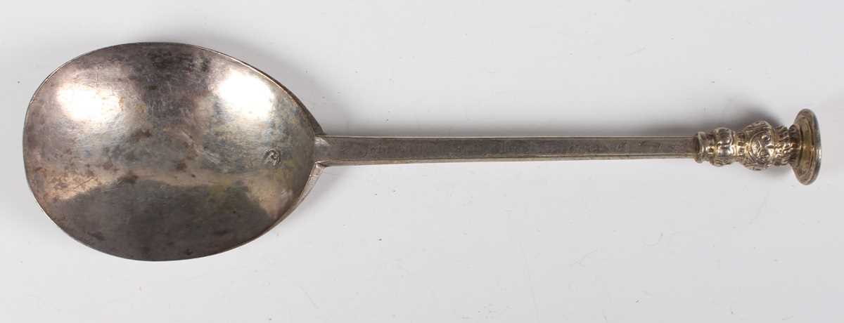 A mid-17th century provincial silver seal top spoon, probably West Country, with fig shaped bowl,