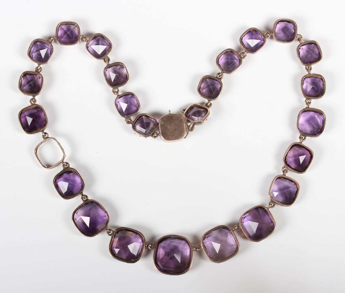 A gold and amethyst necklace, early 19th century, mounted with a row of graduated cushion shaped - Image 3 of 4