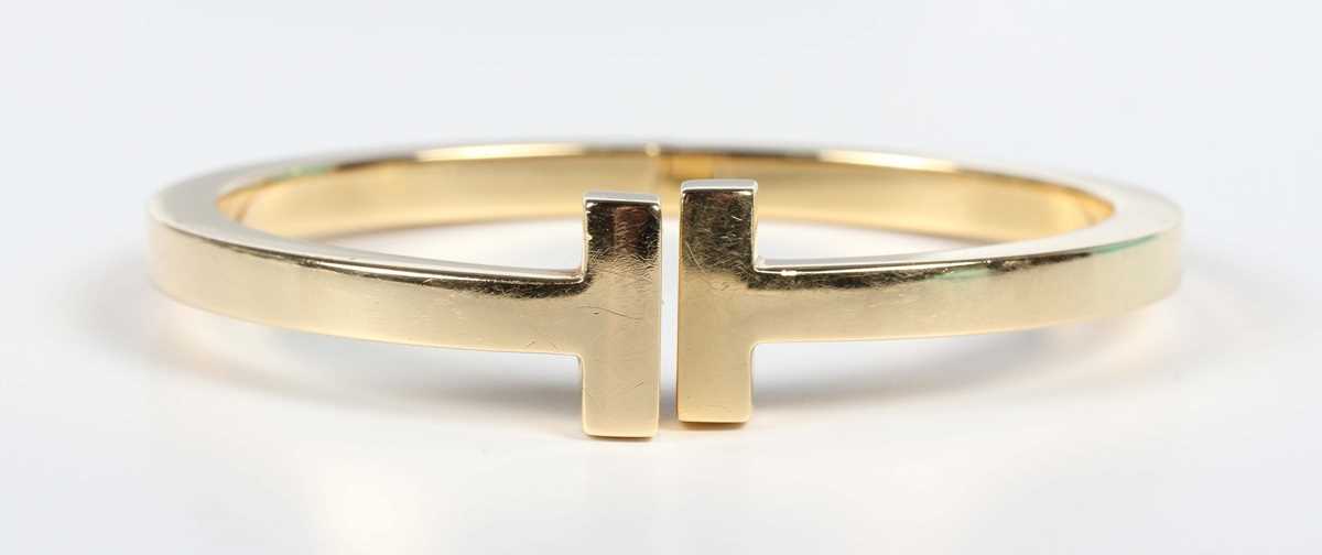 A Tiffany & Co gold 'Tiffany T Collection' square hinged bracelet, detailed ‘Tiffany & Co Au 750’, - Image 2 of 6
