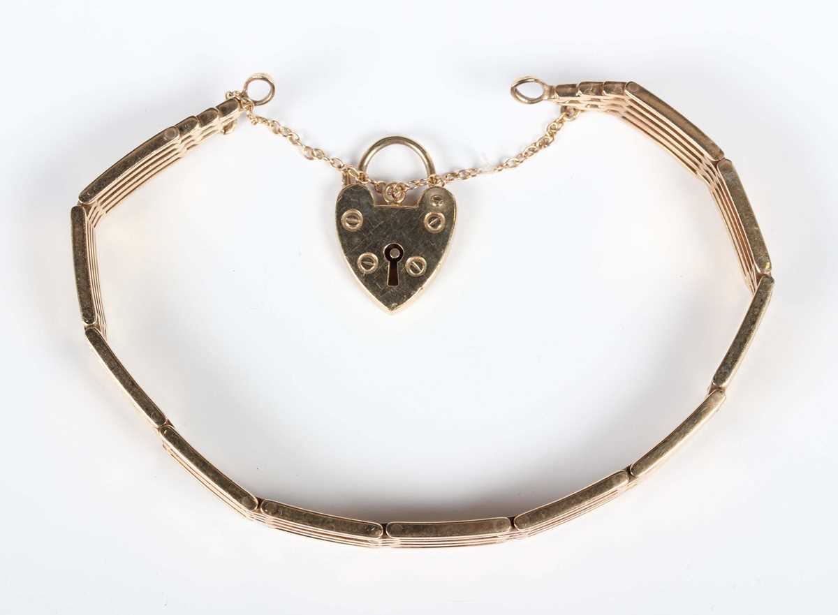 A 9ct gold curved bar link gate bracelet, Birmingham 1961, on a 9ct gold heart shaped padlock clasp, - Image 2 of 4