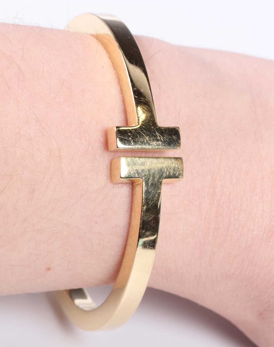 A Tiffany & Co gold 'Tiffany T Collection' square hinged bracelet, detailed ‘Tiffany & Co Au 750’, - Image 4 of 6