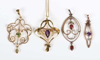 A gold, amethyst and seed pearl pendant brooch, mounted with the pear shaped amethyst between two