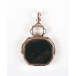 A gold, bloodstone and sardonyx rotating fob seal of octagonal form, detailed ‘10ct’, weight 8.5g,