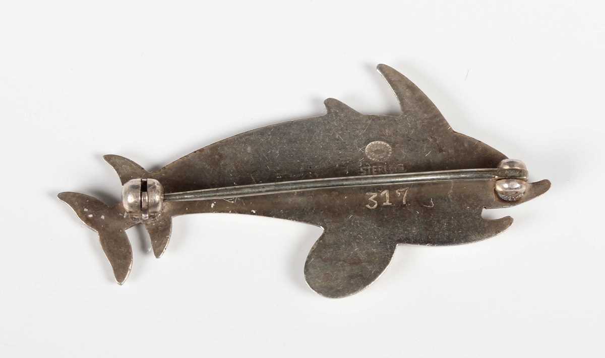 A Georg Jensen sterling silver brooch, designed as two dolphins, detailed ‘Georg Jensen Sterling - Image 2 of 3