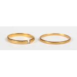 A 22ct gold wedding ring, London 1952 (shank cut), and another 22ct gold wedding ring, ring size