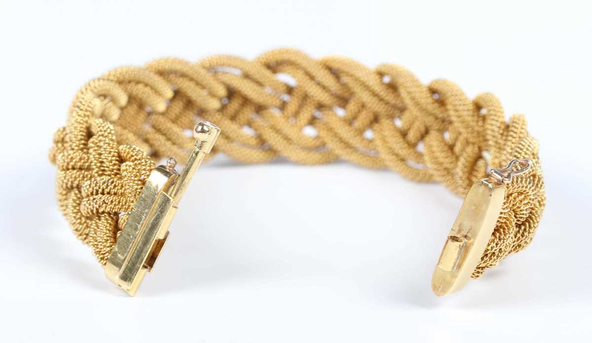 A gold bracelet in an interwoven ropetwist form design, on a sliding clasp, detailed ‘18A B’, weight - Image 4 of 5