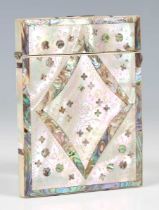 A 19th century mother-of-pearl visiting card case with engraved and inlaid decoration, length 10.