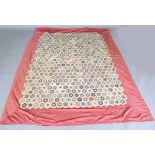 A mid-Victorian silk patchwork quilt, 190cm x 150cm, together with another similar silk and cotton