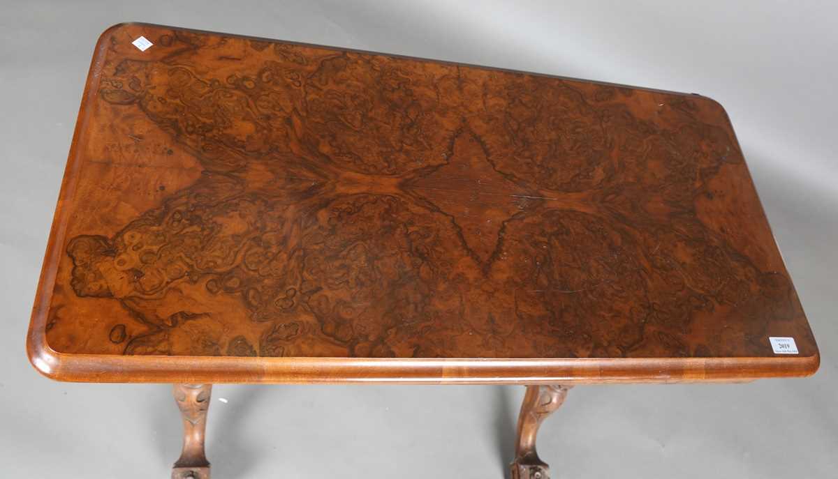 A mid-Victorian burr walnut rectangular fold-over card table, raised on fluted legs and carved feet, - Image 2 of 14