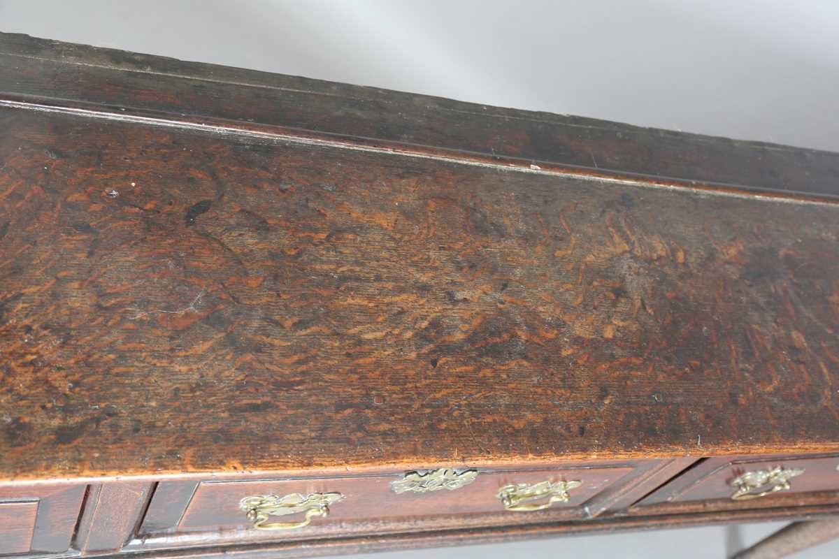An early 18th century provincial oak dresser base, fitted with three deep drawers, height 77cm, - Image 3 of 13