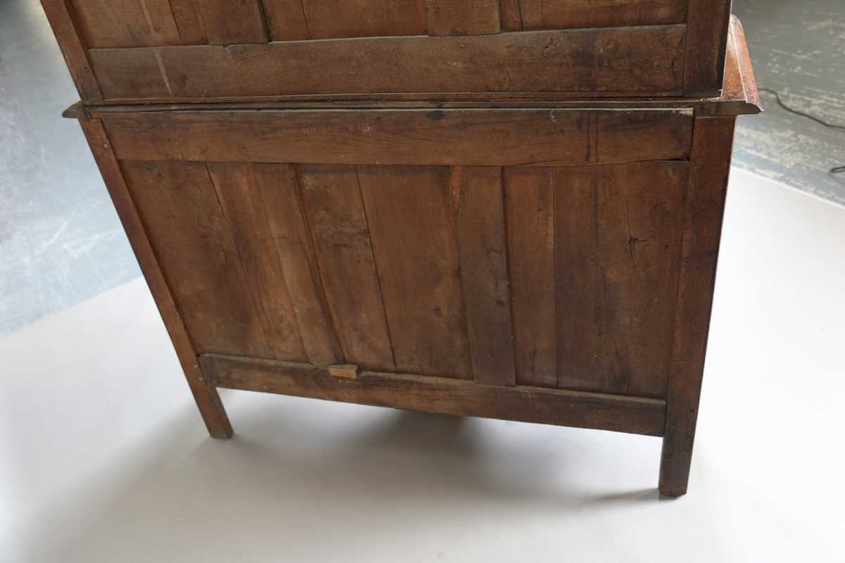 A 19th century French oak side cabinet with an arched pediment and four carved panel doors, height - Image 12 of 14
