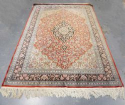 A fine Chinese silk rug, in the Persian style, late 20th century, the burnt orange field with a