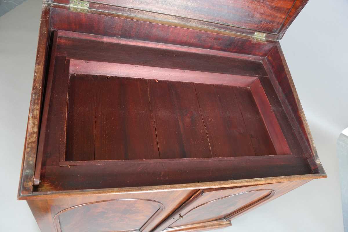 An early Victorian mahogany wash cabinet, fitted with a hinged lid above two arch panelled doors, - Image 7 of 14