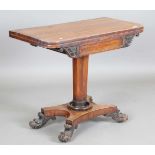 A Regency rosewood fold-over card table, raised on a quatrefoil base, height 73.5cm, width 92cm,