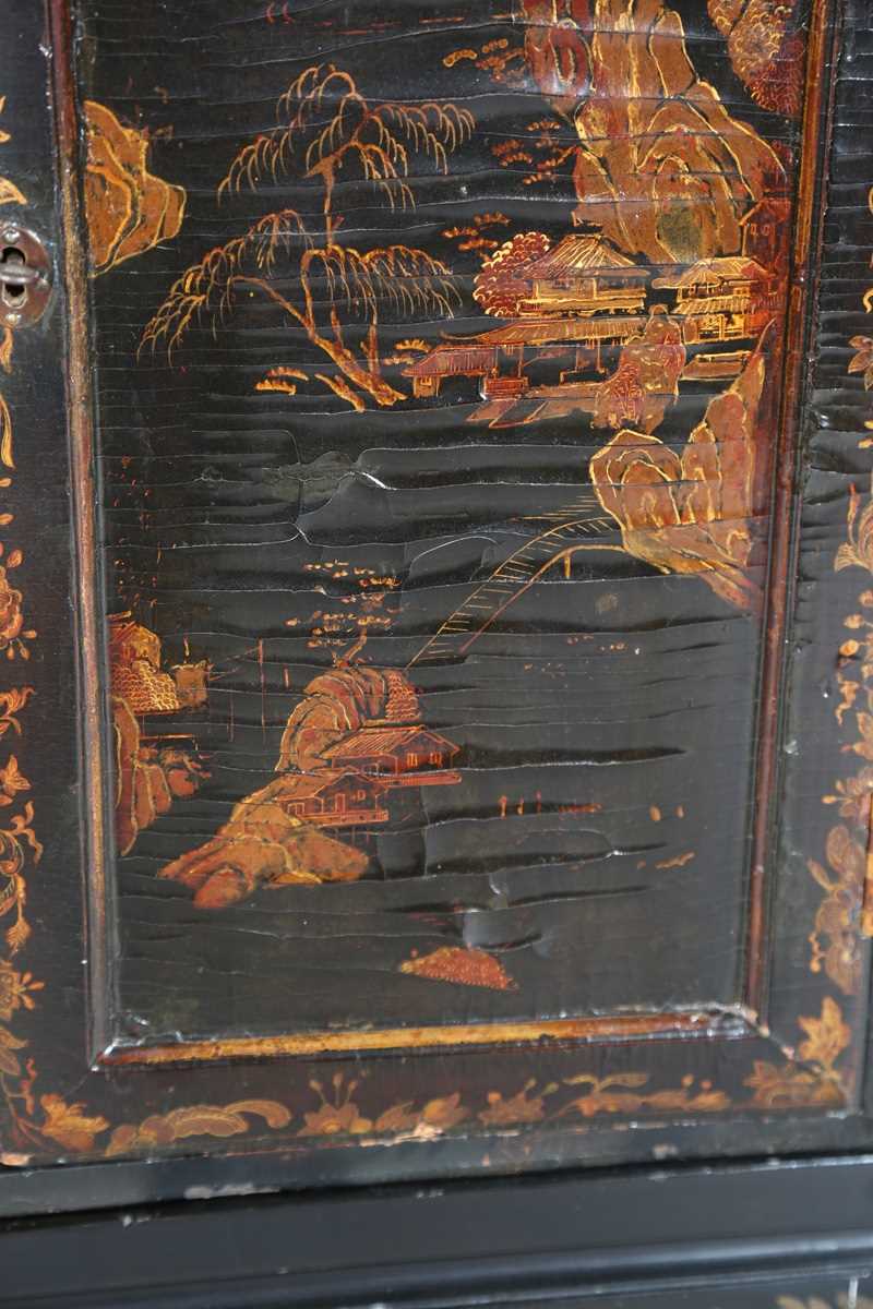 An 18th century Chinese black lacquered collector's cabinet, decorated in gilt with landscape - Image 18 of 28