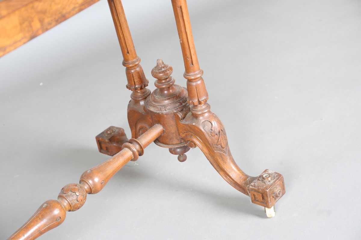 A mid-Victorian burr walnut rectangular fold-over card table, raised on fluted legs and carved feet, - Image 7 of 14